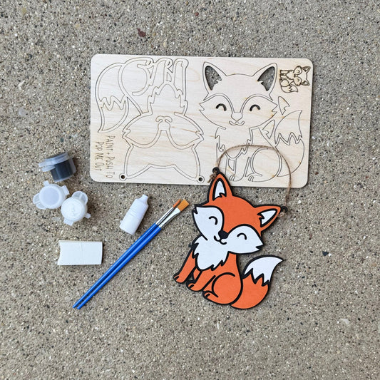 Wood fox hanger pop out kit with orange, black, and white paint