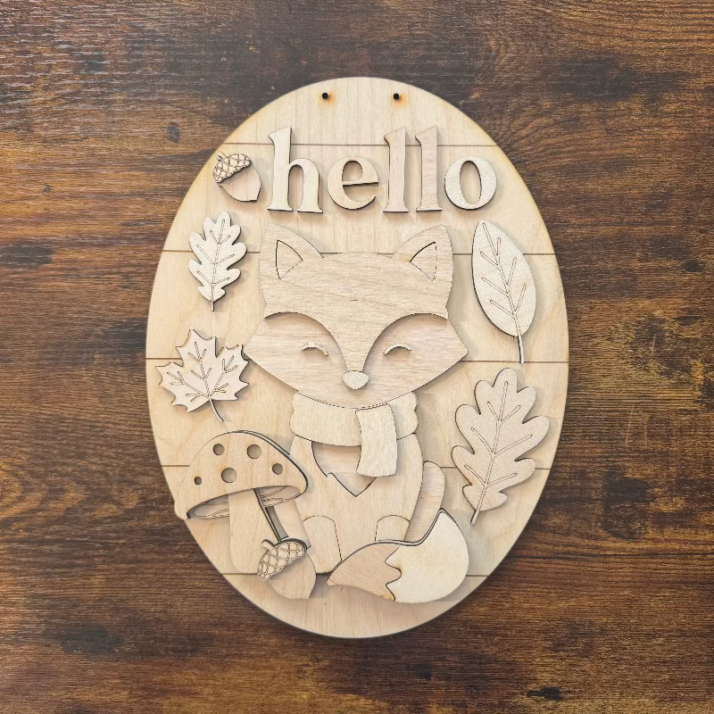 Blank wooden sign DIY kit with fox design and 'hello' text on a wooden background