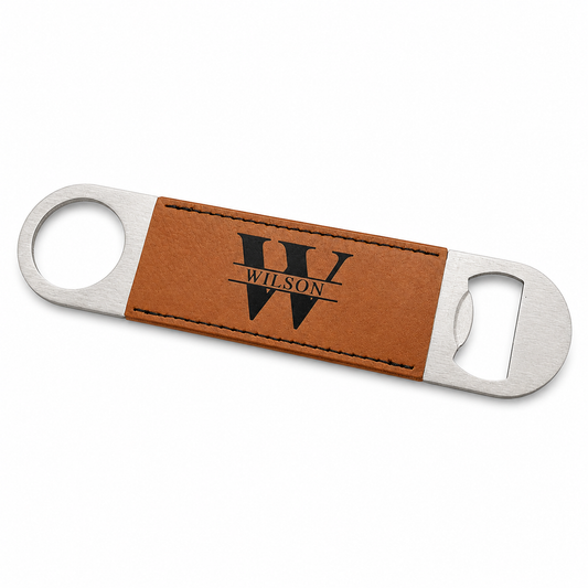 Leather wrapped bottle opener with custom engraved "W" on a white background.